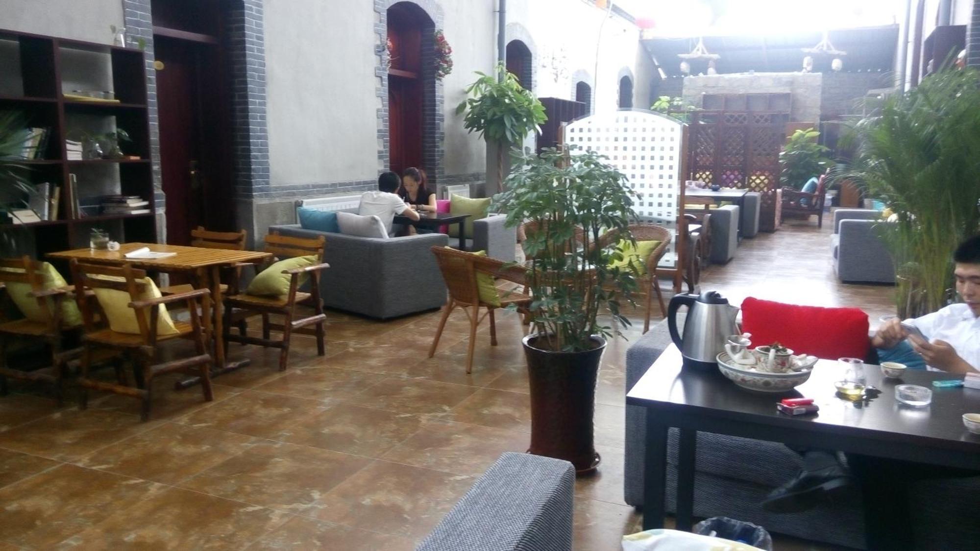 Jinan Mountain And Sea Culture Hotel Room photo